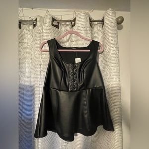 Peplum faux leather black blouse. Torrid m/l size 00 plus size. new with tags.